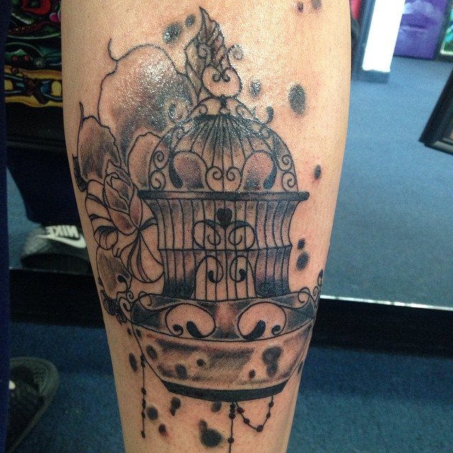 Black and grey detailed tattoo