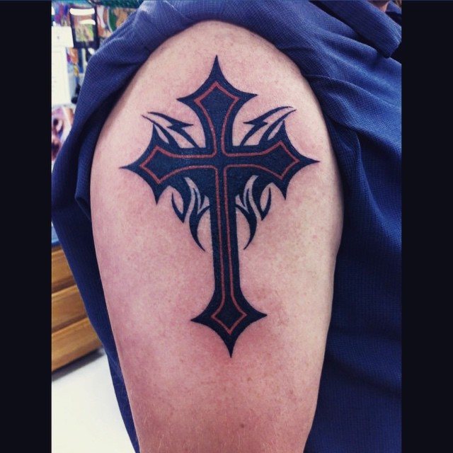 Bold blackwork cross tattoo