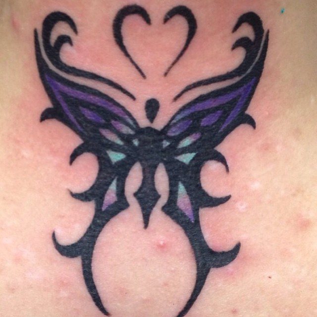 Tribal butterfly tattoo