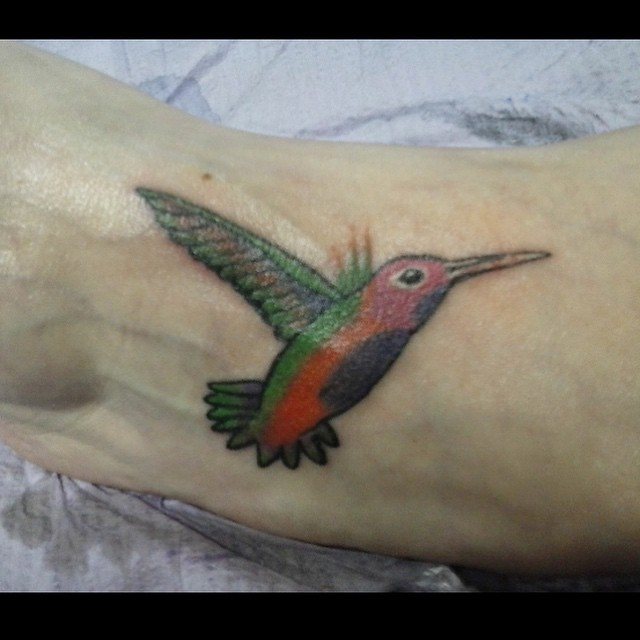 Color hummingbird tattoo